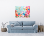 Load image into Gallery viewer, vibrant, happy abstract painting with pinks and blues and stars and hearts and an ocean vibe over a soft grey couch in an airy white room
