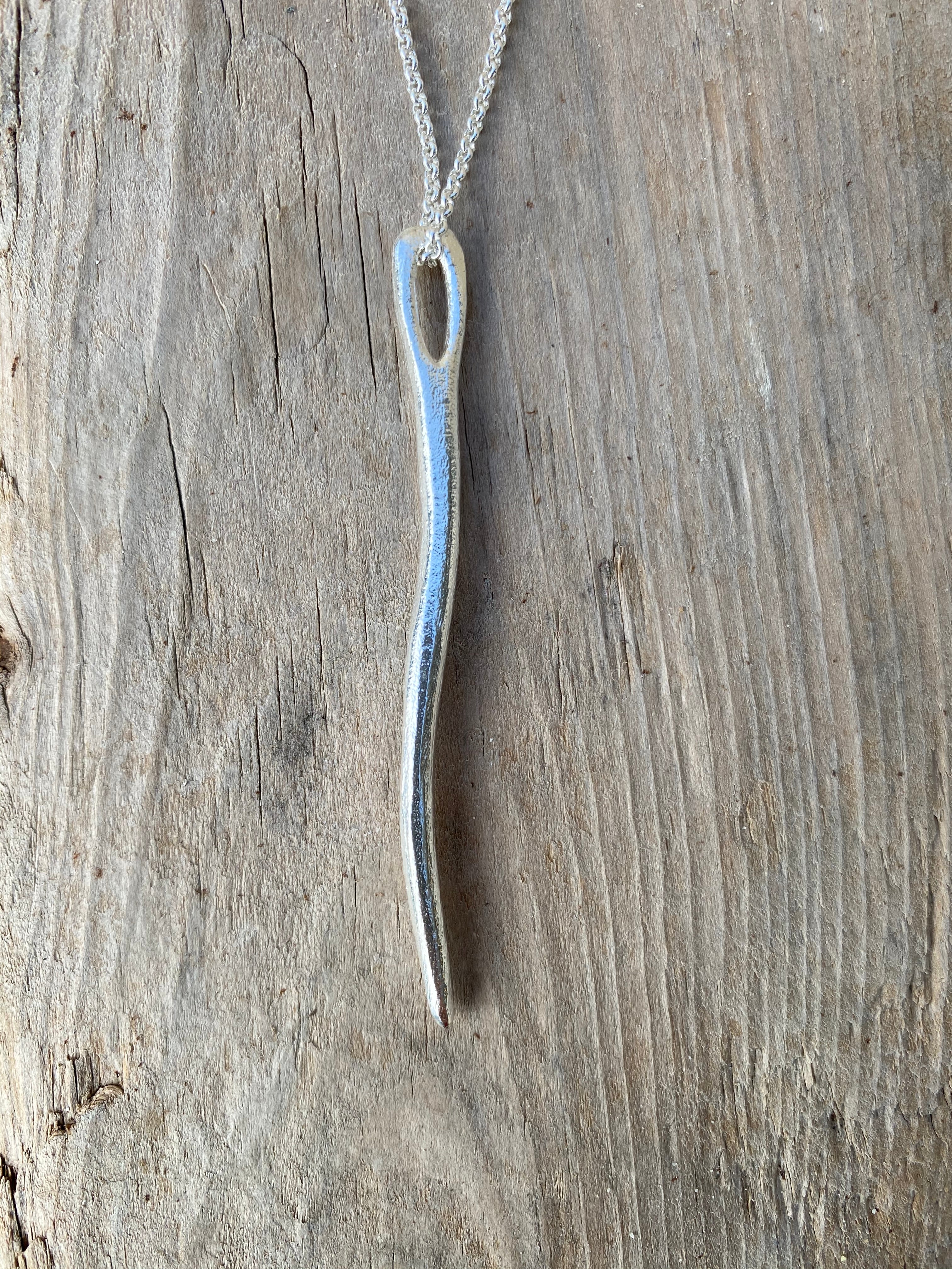 Evolution Tapestry Needle Pendant