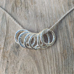 Load image into Gallery viewer, Evolution Tapestry Needle Pendant

