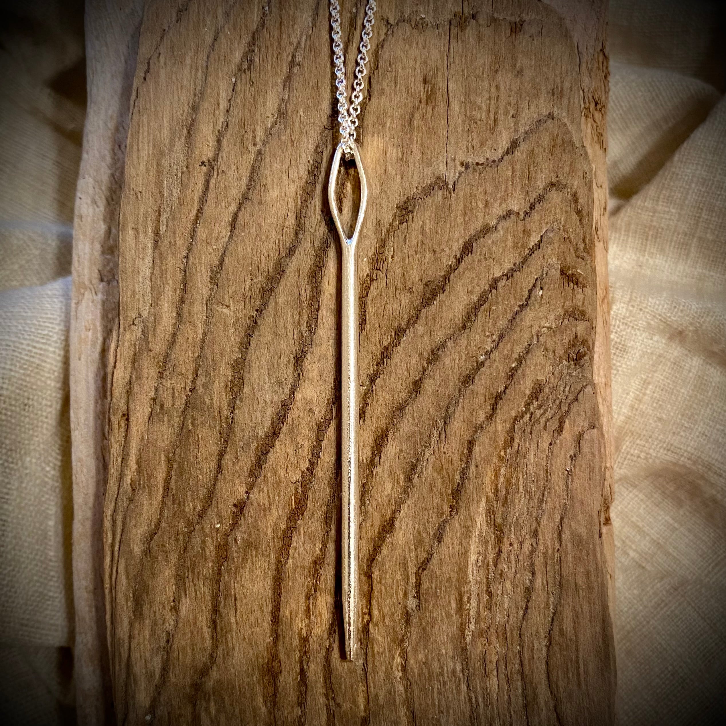 Evolution Tapestry Needle Pendant