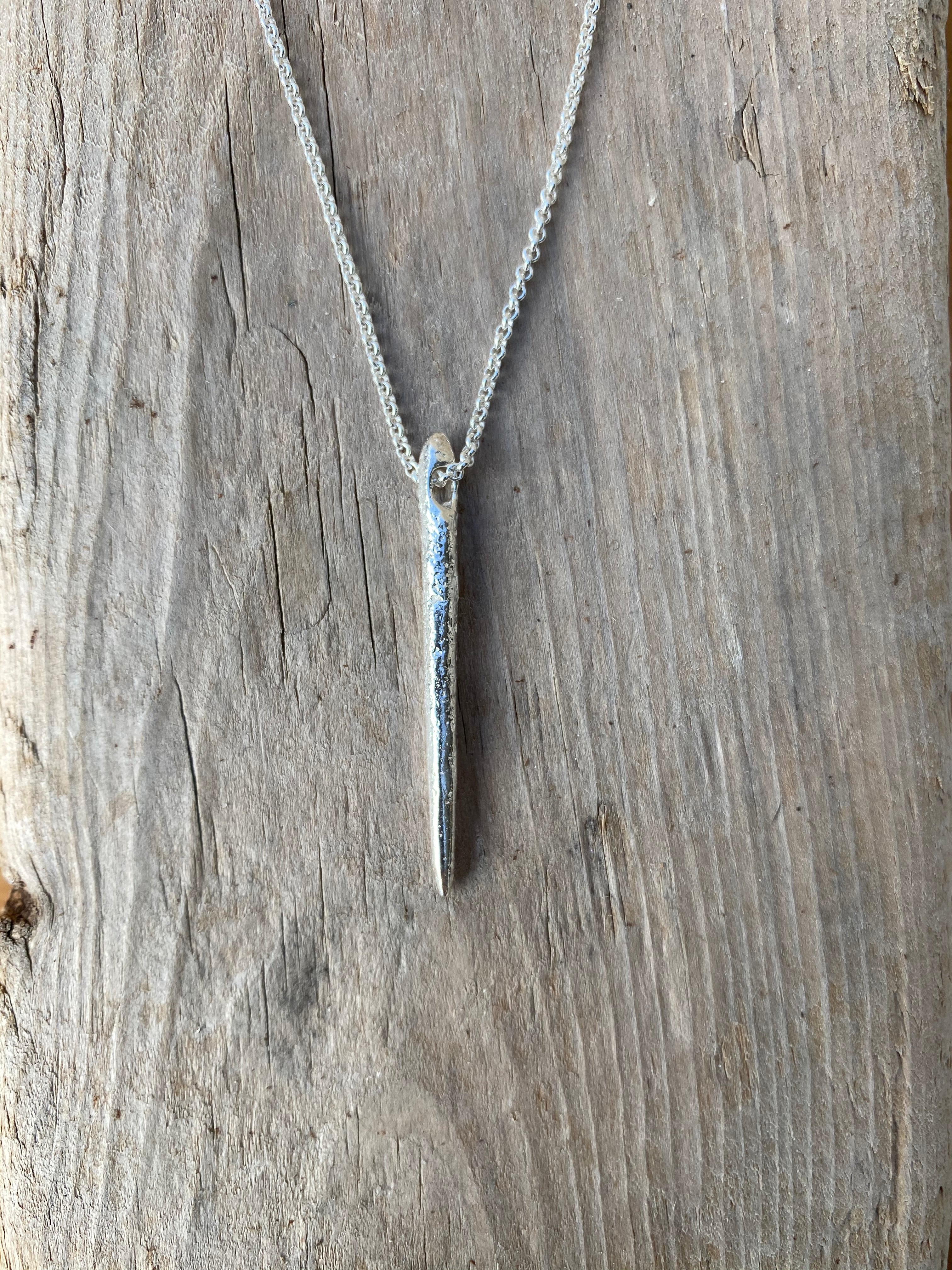 Evolution Tapestry Needle Pendant