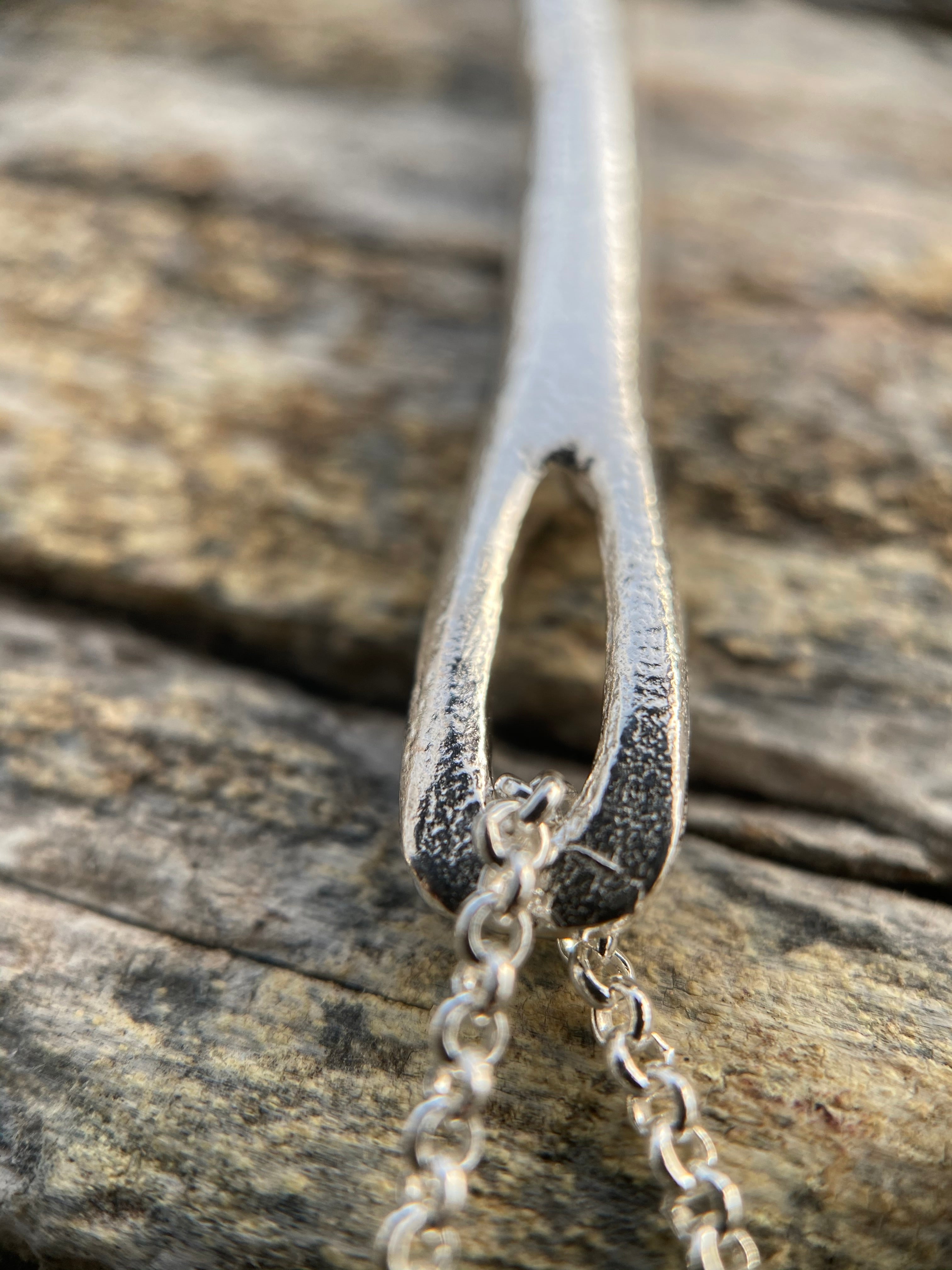 Evolution Tapestry Needle Pendant