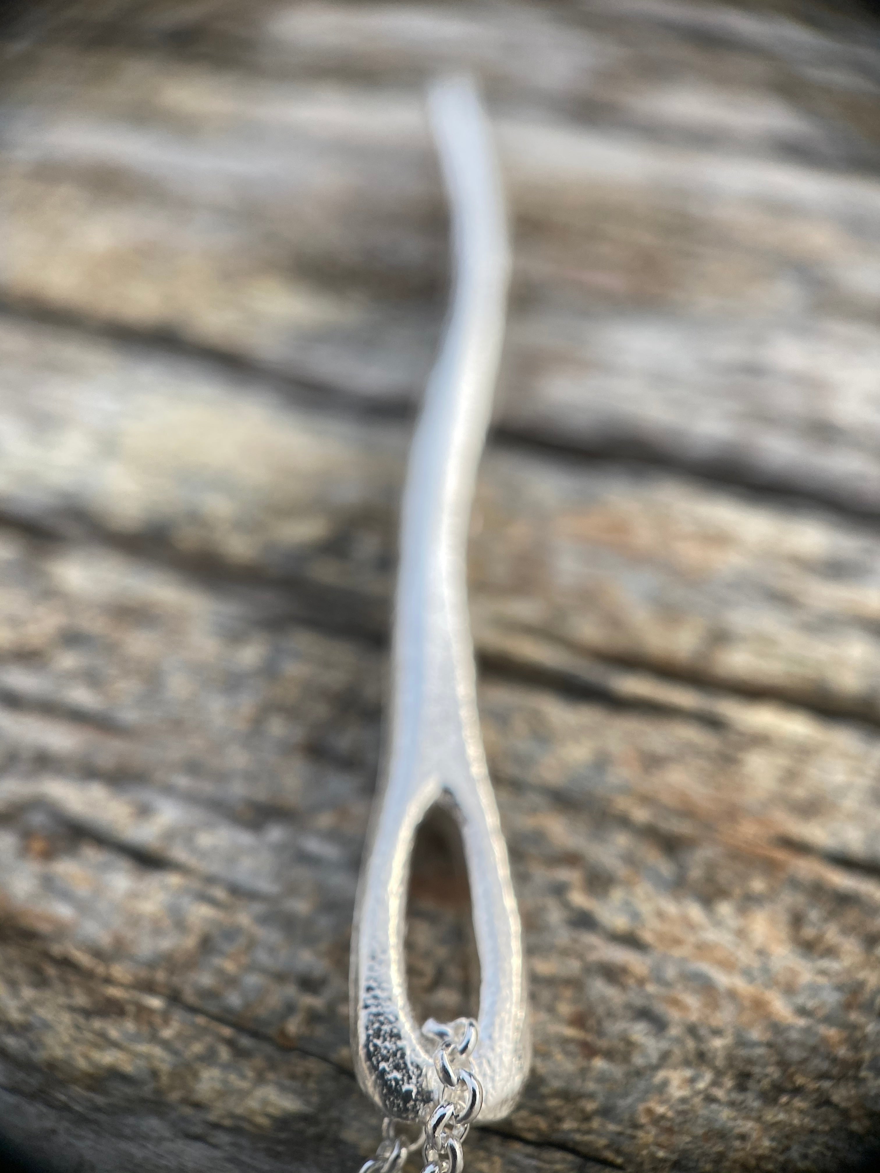 Evolution Tapestry Needle Pendant