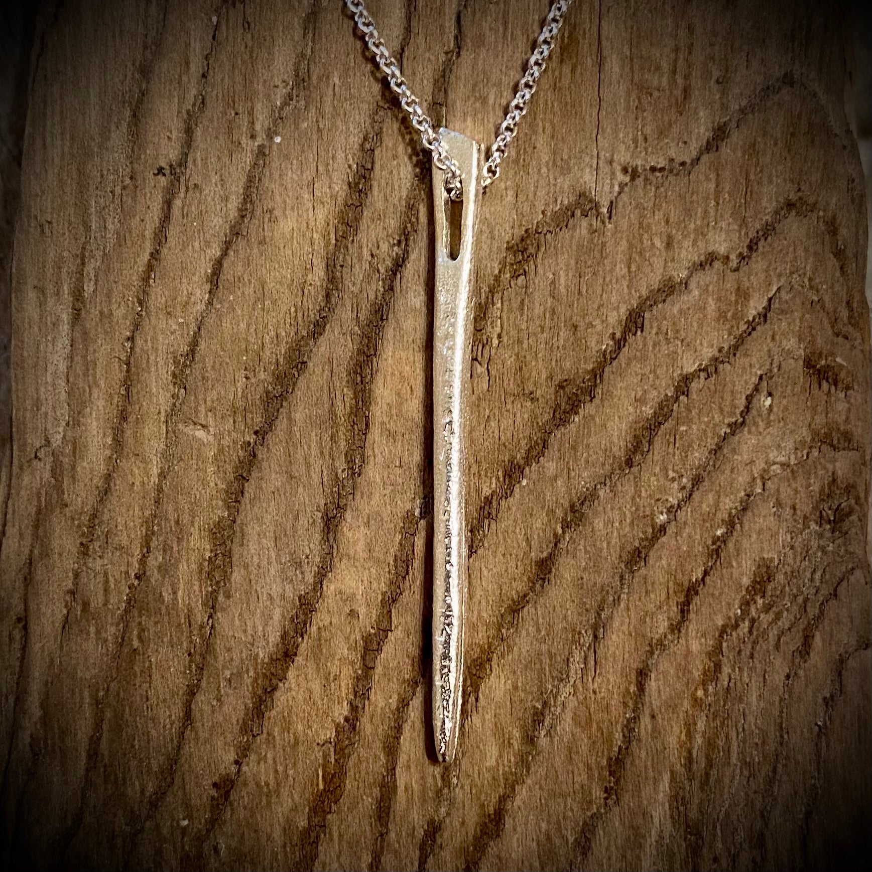 Evolution Tapestry Needle Pendant