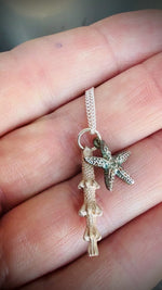 Load and play video in Gallery viewer, Handmade Starfish &amp; Sea Urchin Spine Duo Necklace
