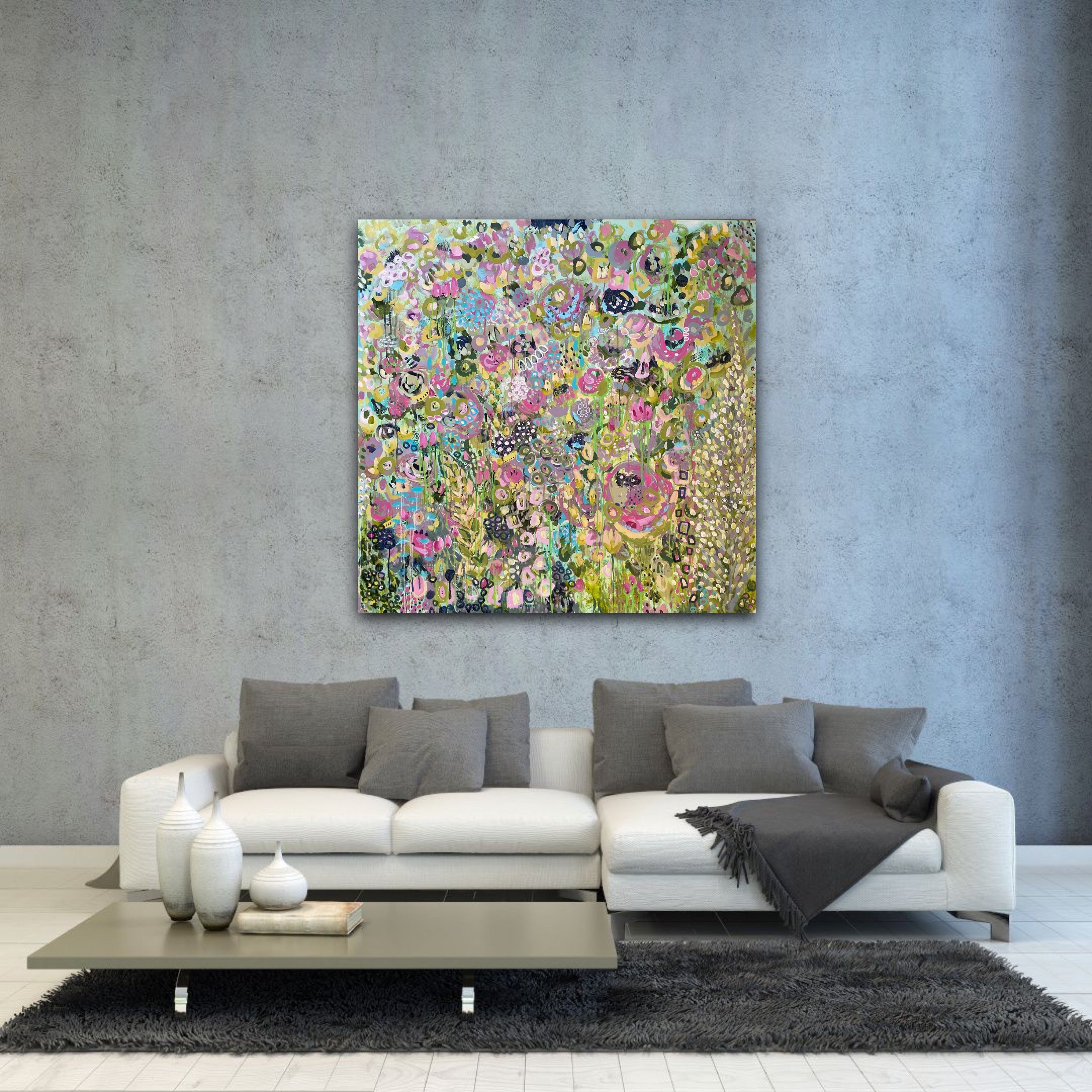 large bright abstract floral painting in sleek modern grey living room