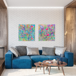 Load image into Gallery viewer, bright vibrant happy abstract floral painting by artist kate shepherd host of the creative genius podcast on a white brick wall in front of a blue couch

