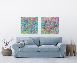 bright vibrant happy abstract floral painting by artist kate shepherd host of the creative genius podcast on a white wall with its matching painting in front of a grey couch