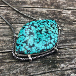 Load image into Gallery viewer, authentic turquoise horizontal shaped pendant on unique setting weathered driftwood background. ozidized sterlihg silver chain
