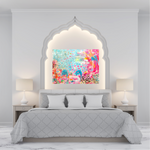 Load image into Gallery viewer, vibrant, happy abstract painting with pinks and blues and stars and hearts and an ocean vibe over a bed with white bedding in an airy white room
